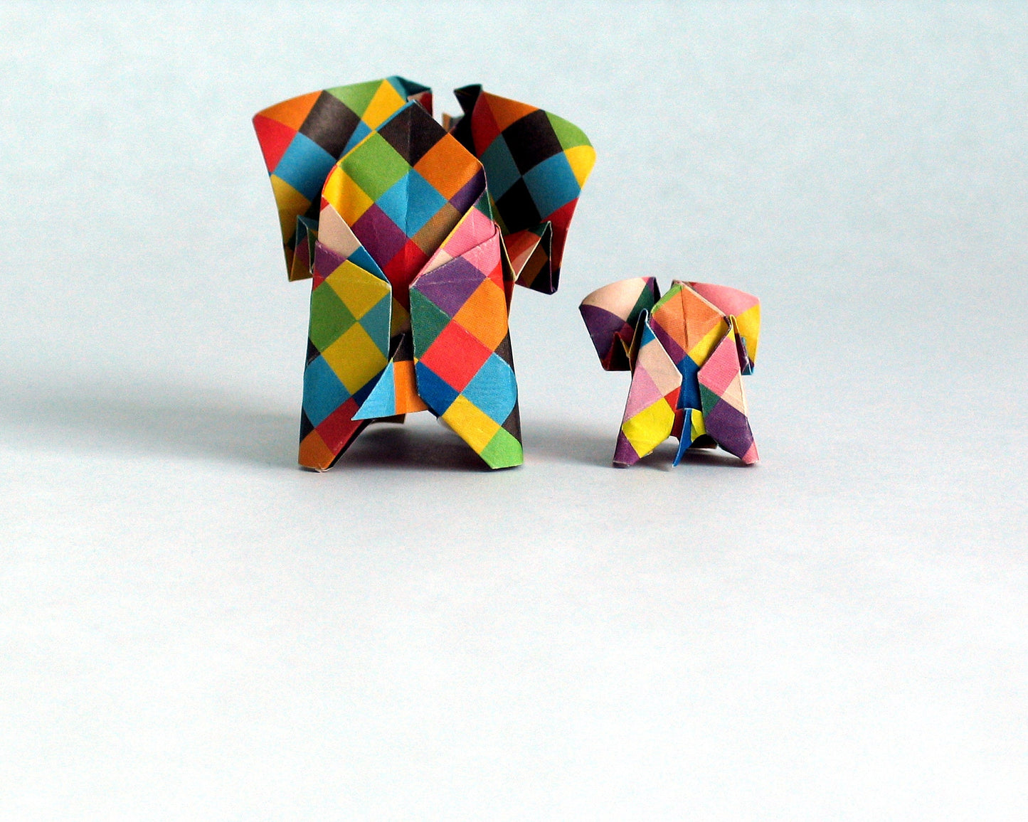 Origami Elephant Family: Handmade Paper Sculpture with Butterfly